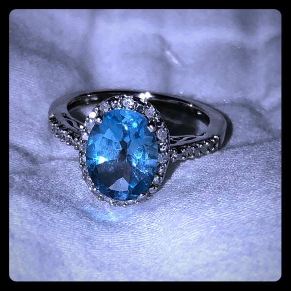 Swarovski Jewelry - Swarovski Crystal and light sapphire ring 5.5